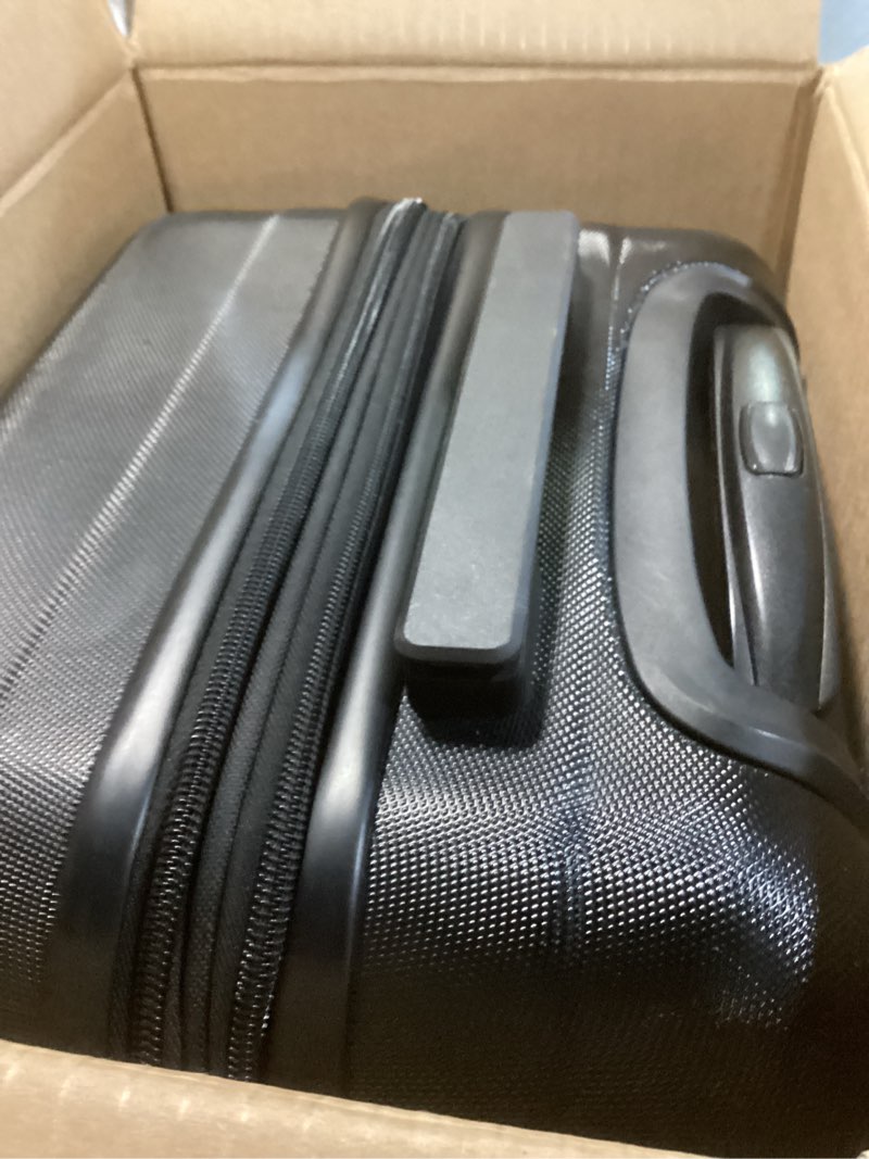 Condition photo showing New/Like New for amazon basics 21" hardside carry-on luggage, hardshell suitcase with wheels, expandable for up to 25% more space, with scratch-resistant surface, four multi-directional wheels, black black carry-on