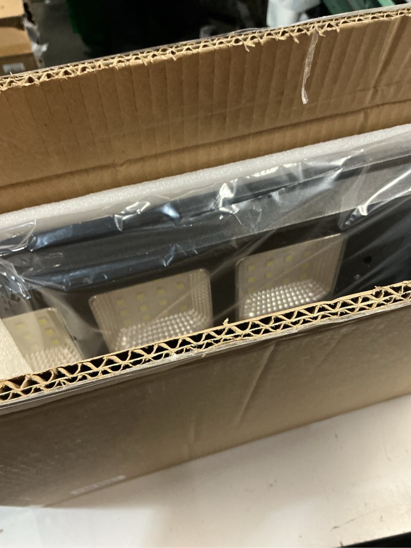 Condition photo showing New/Like New for solar street light, solar floodlights outdoor waterproof motion sensor 6500k dusk to dawn light 3000w-1p
