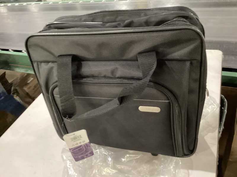 Condition photo showing New/Like New for Targus 16 inch Rolling travel laptop case, Black - Travel briefcase and small rolling bag - Spacious foam padded laptop case 16" (TBR003US) Rolling Case