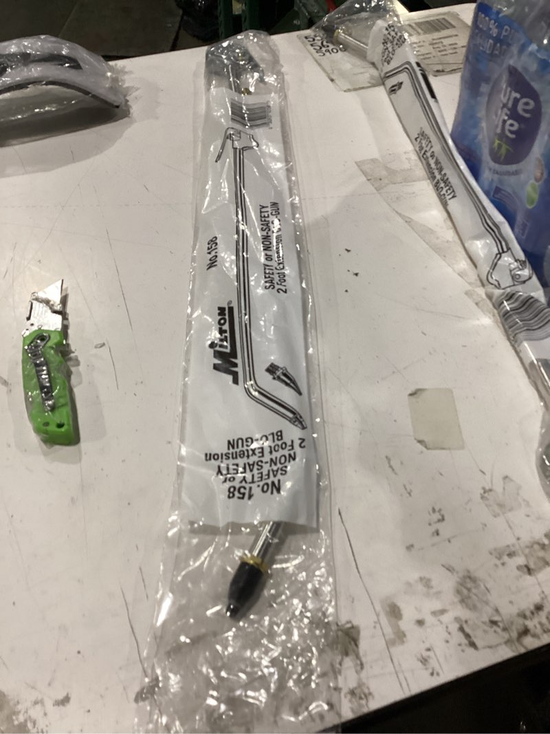Condition photo showing New/Like New for blow gun 2  ext