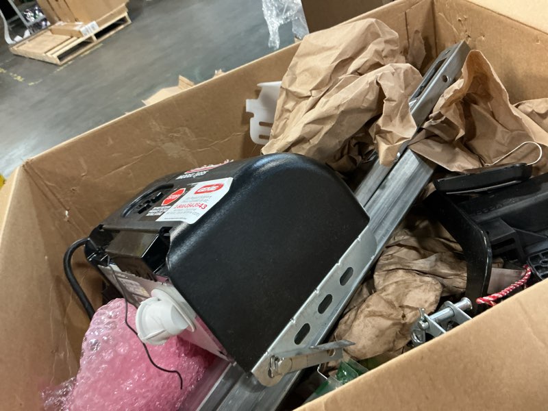 Condition photo showing As Is for Genie Chain Drive 500 Garage Door Opener - Model 1035 - Reliable Chain Drive Garage Opener,Black Chain 500