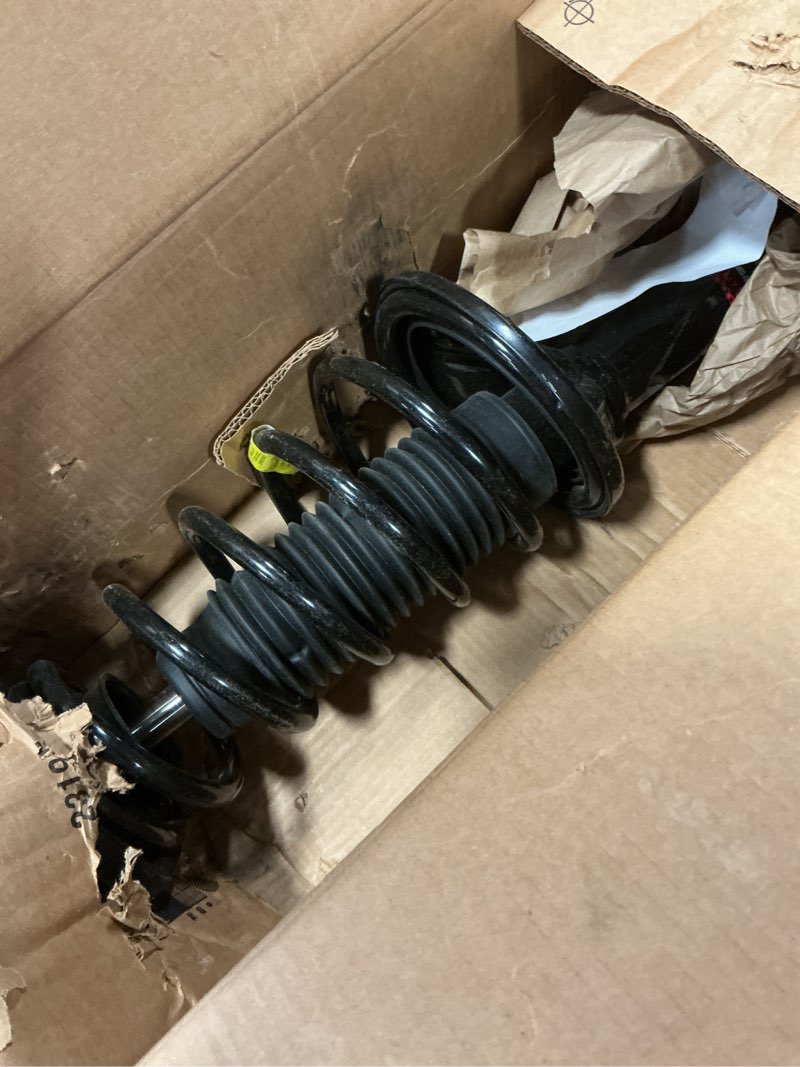Condition photo showing As Is for Monroe Quick-Strut 172206 Suspension Strut and Coil Spring Assembly for Toyota Camry