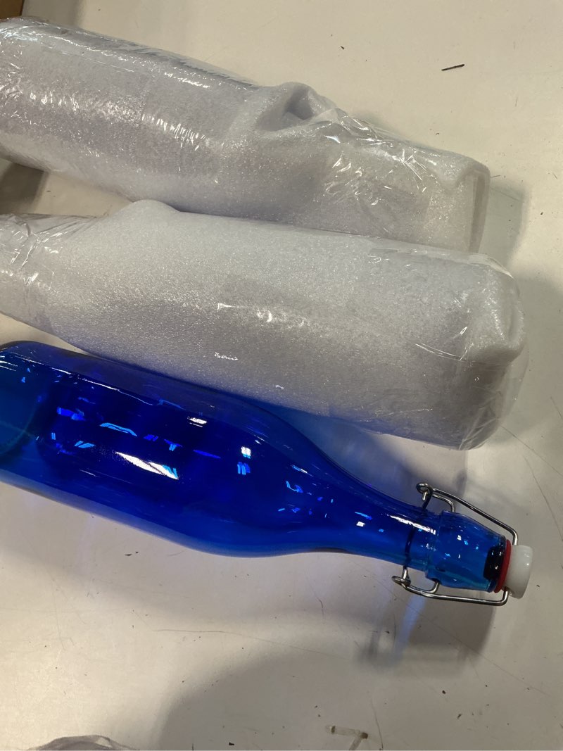 Condition photo showing New/Like New for 3 pcs cobalt blue glass bottle 1 l / 33.75 oz decorative bottles cobalt blue swing top glass bottles with airtight lid for homemade wine diy make your own drinks, decoration for centerpieces 33.75oz cobalt blue
