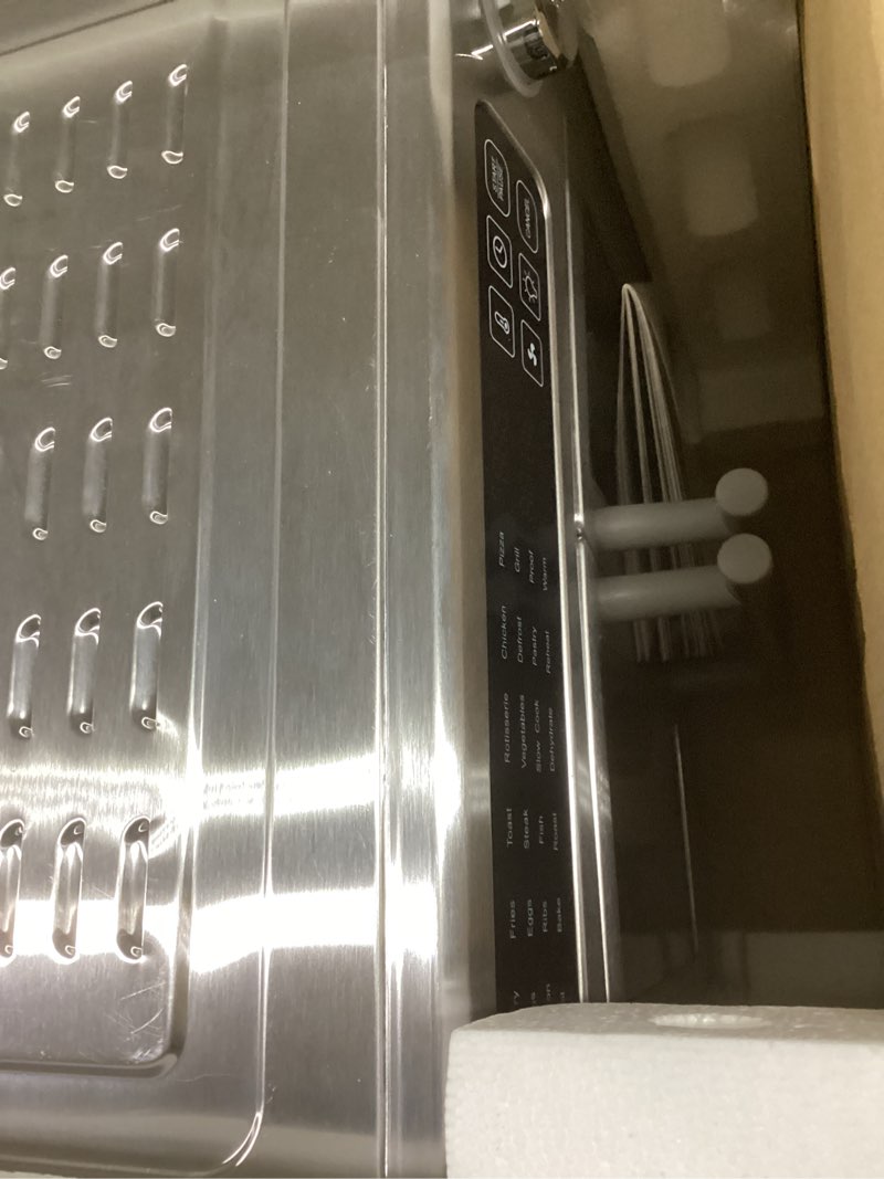 Condition photo showing As Is for dan - emeril lagasse extra large french door air fryer toaster oven combo, 24 cooking functions and digital controls, 7 accessories included, stainless steel finish, 26qt capacity
