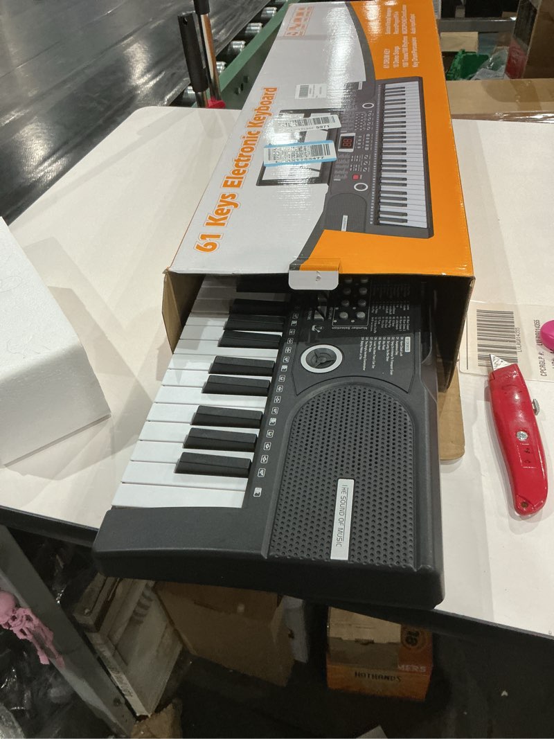 Condition photo showing Good Condition for 61 keys keyboard piano, Electronic Digital Piano with Built-In Speaker Microphone, Sheet Stand and Power Supply, Portable piano Keyboard Gift Teaching for Beginners Black