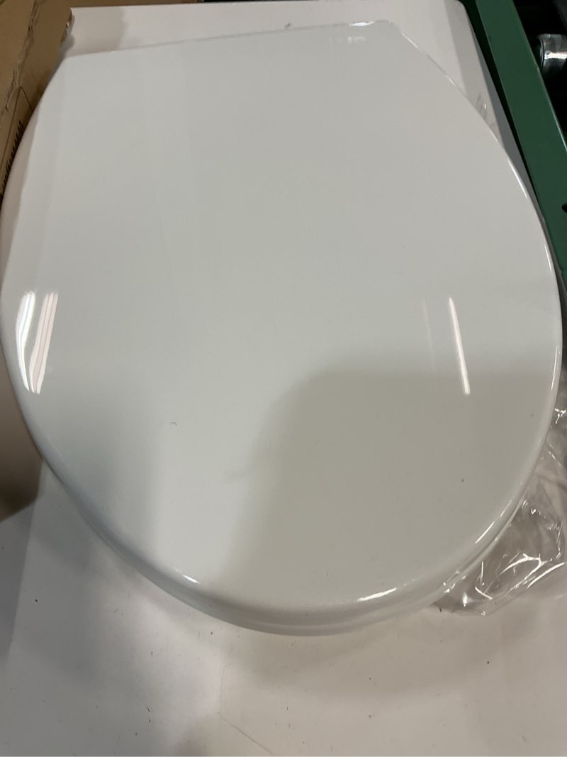 Condition photo showing As Is for kohler cachet® nightlight soft close toilet seat elongated, readylatch®, grip-tight hardware, white white elongated night light