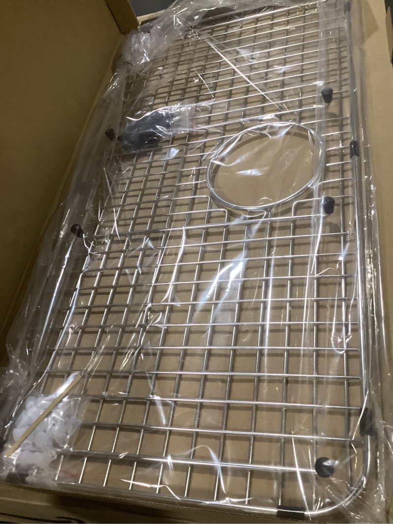 Condition photo showing Good Condition for serene valley sink bottom grid 28" x 13-15/16", rear drain with corner radius 2", sink protector ndg2814r