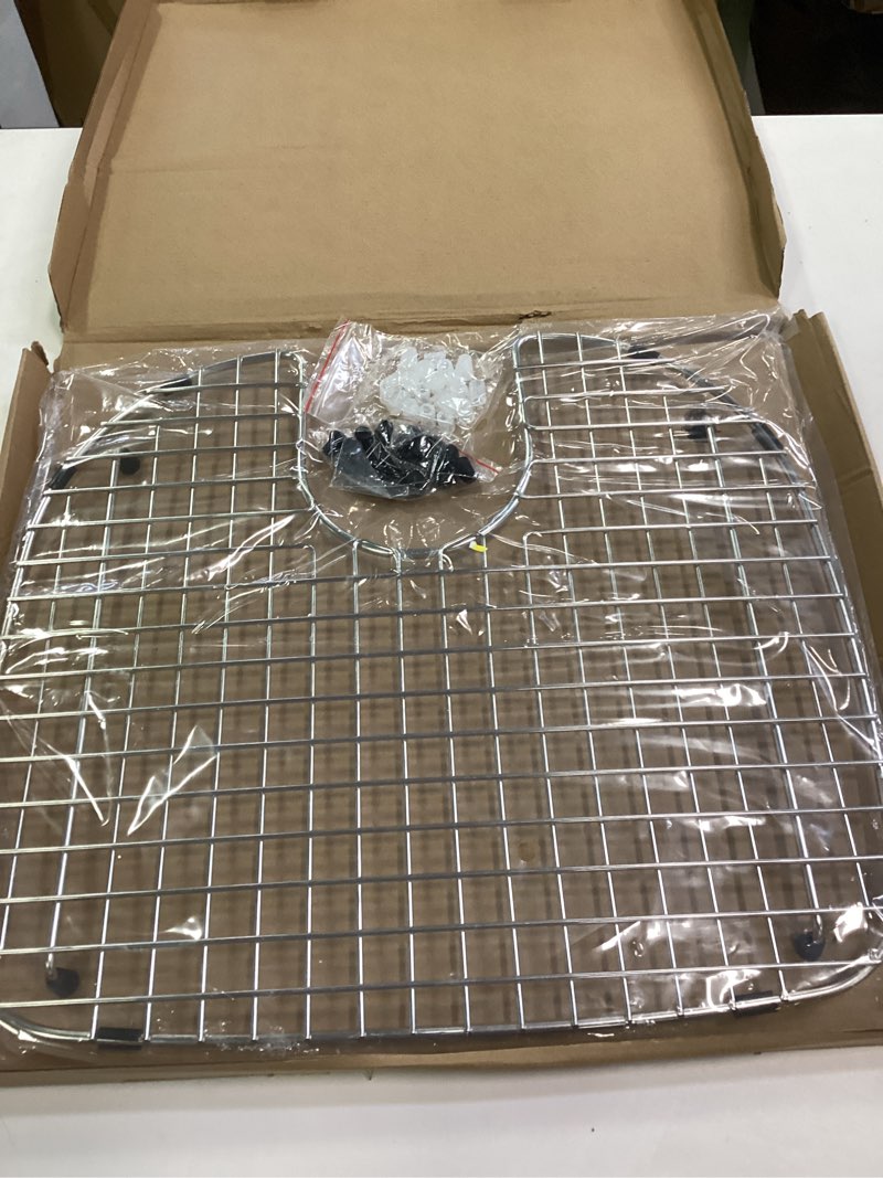 Condition photo showing Brand New for serene valley sink grid 18-1/2" x 16-5/8", rear drain with bottom corner radius 2-1/2" and top corner radius 6-1/2"?bottom grid ndg1917r