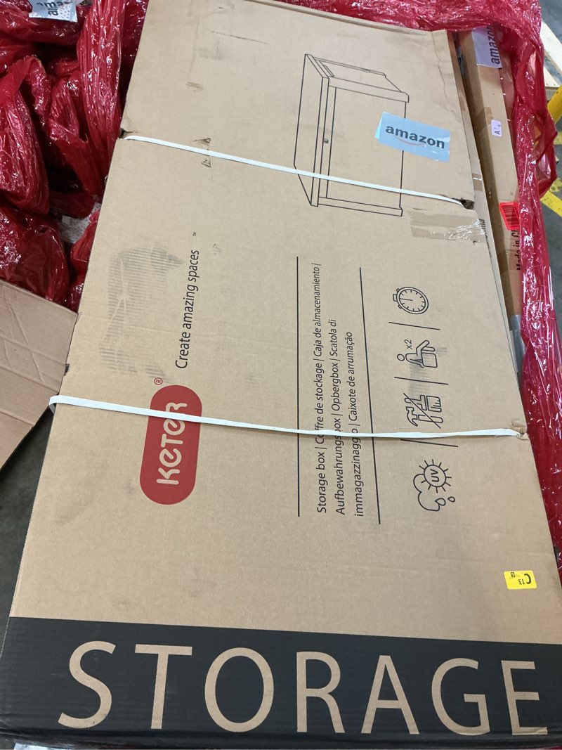 Condition photo showing New/Like New for keter westwood 150 gallon resin large outdoor storage box for patio furniture, outdoor cushions, garden tools and pool floats, dark grey