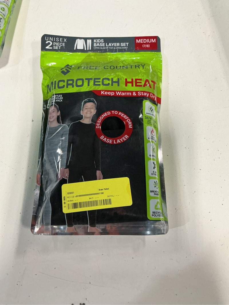 Condition photo showing New/Like New for (medium 7/8)free country youth unisex 2 piece base layer 22 sleeve and pant set (black