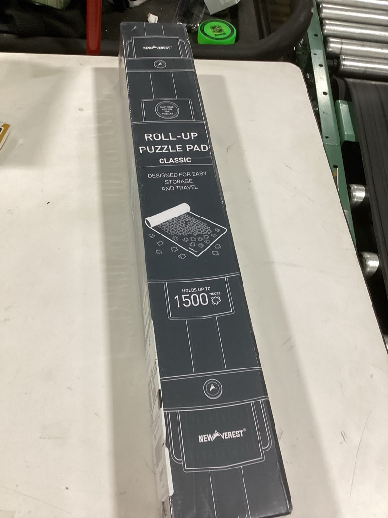 Condition photo showing New/Like New for The Original Newverest Jigsaw Puzzle Mat Roll Up, Saver Pad 46” x 26” Portable Keeper Up to 1500 Pieces with Non-Slip Rubber Bottom & Smooth Top + 3 Puzzle Sorting Trays & Travel-Friendly Storage Bag 1500pcs
