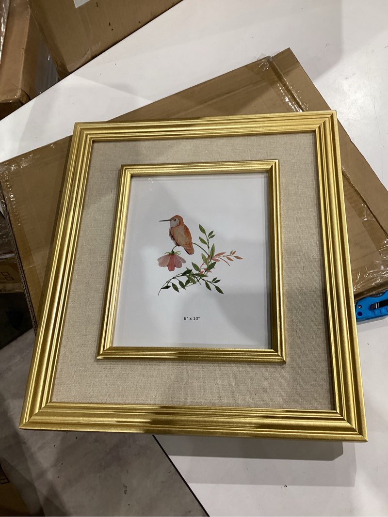 Condition photo showing Good Condition for item similar// 8x10 picture frame, matte gold modern thin aluminum metal photo frame with hd glass, fits 6x8 with mat or 8 x 12 without mat, for tabletop and wall mounting, 1 pack 8x12-1p matte gold