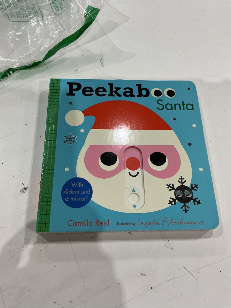 Condition photo showing Good Condition for peekaboo: santa: (an interactive board book for babies & toddlers with mirror & sliders to push, pull, or turn. cute christmas artwork includes an elf, reindeer, tree, & more.) (peekaboo you)