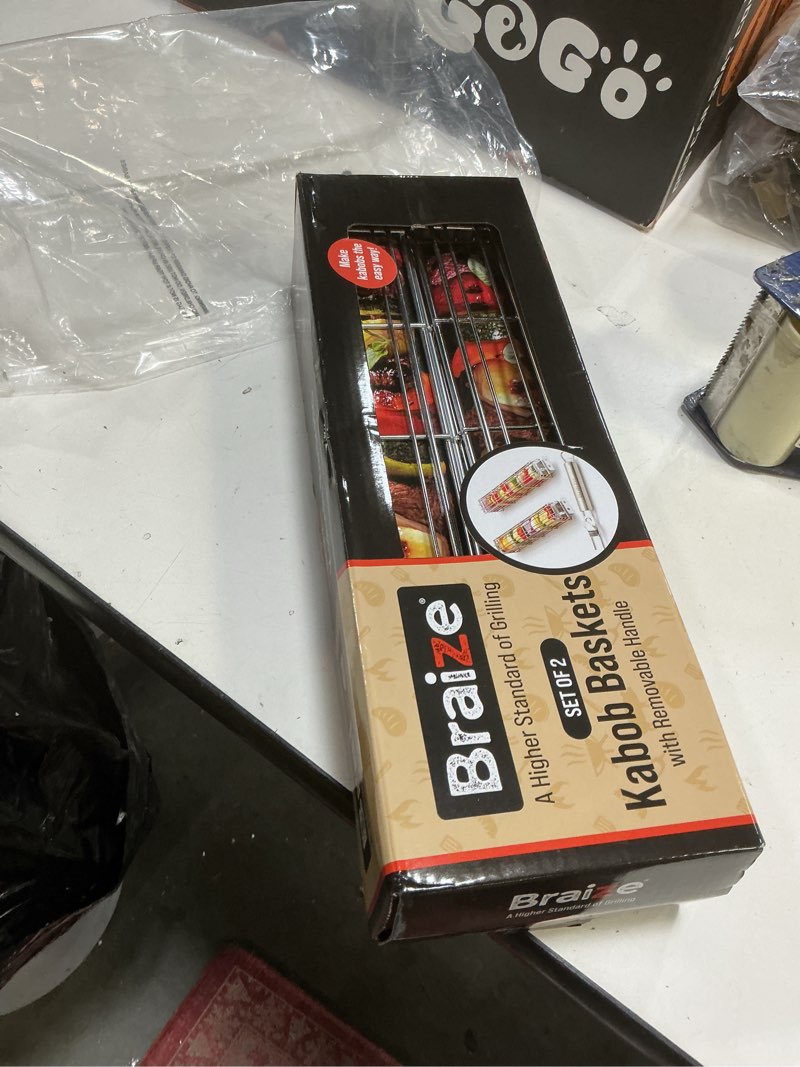 Condition photo showing New/Like New for Large Kabob Grilling Basket with Removable Handle. Stainless Steel construction with a Larger Capacity (12 x 2 x 2) and secure easy-latch lid. (2-Piece Kabob Basket Set)