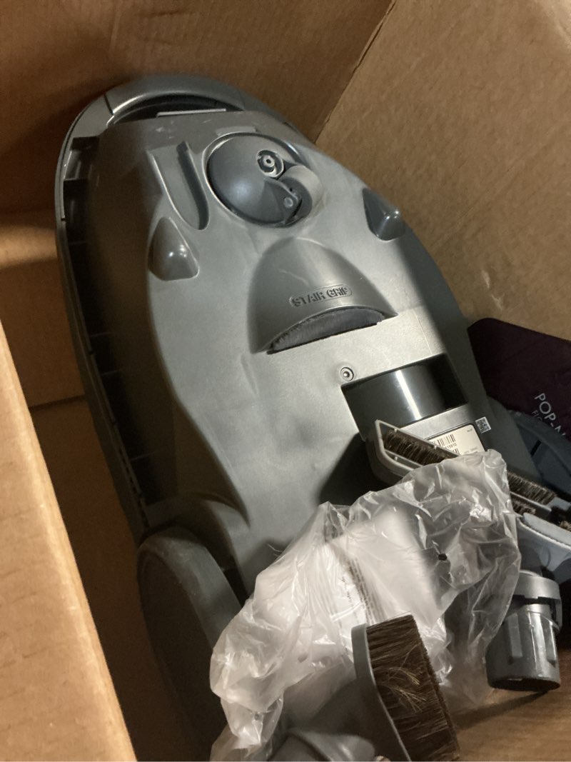 Condition photo showing As Is for kenmore bc4039 600 series pet friendly bagged canister vacuum with pop-n-go, pet powermate, hair eliminator brushroll, hepa filter, performance indicator, extended reach and auto cord rewind
