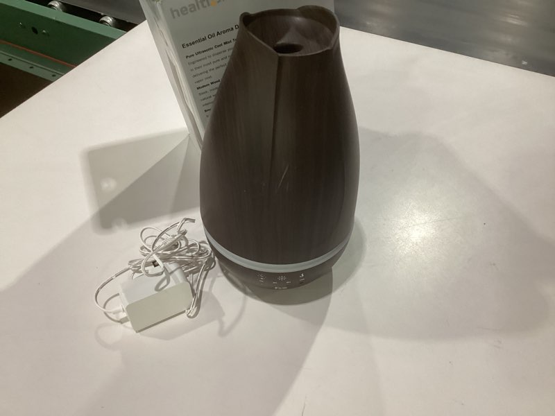 Condition photo showing As Is for healthsmart essential oil diffuser, cool mist humidifier and aromatherapy diffuser with 500ml tank ideal for large rooms, adjustable timer, mist mode and 7 led light colors, brown large brown,not tested