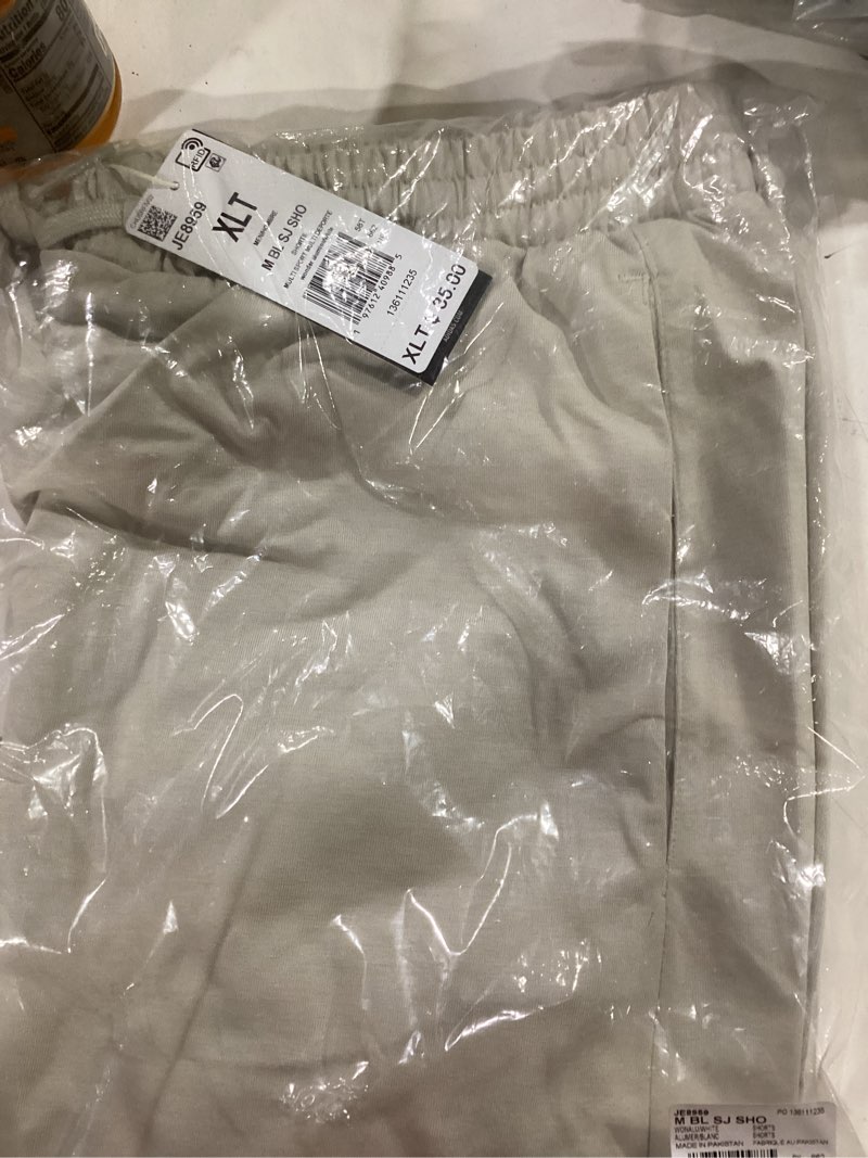 Condition photo showing New/Like New for adidas Men's Essentials Big Logo Single Jersey 7-Inch Shorts X-Large Tall Wonder Alumina/White