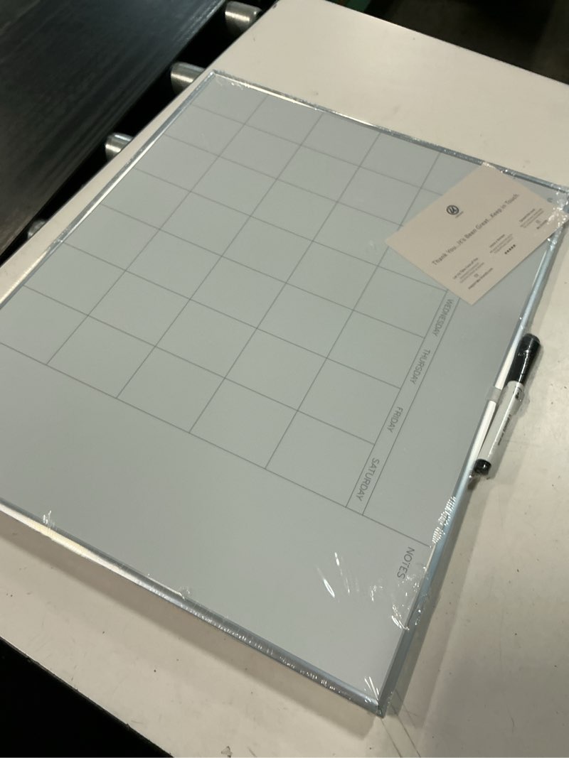 Condition photo showing New/Like New for u brands magnetic dry erase board, undated one month, 20 x 16, white surface, silver aluminum frame