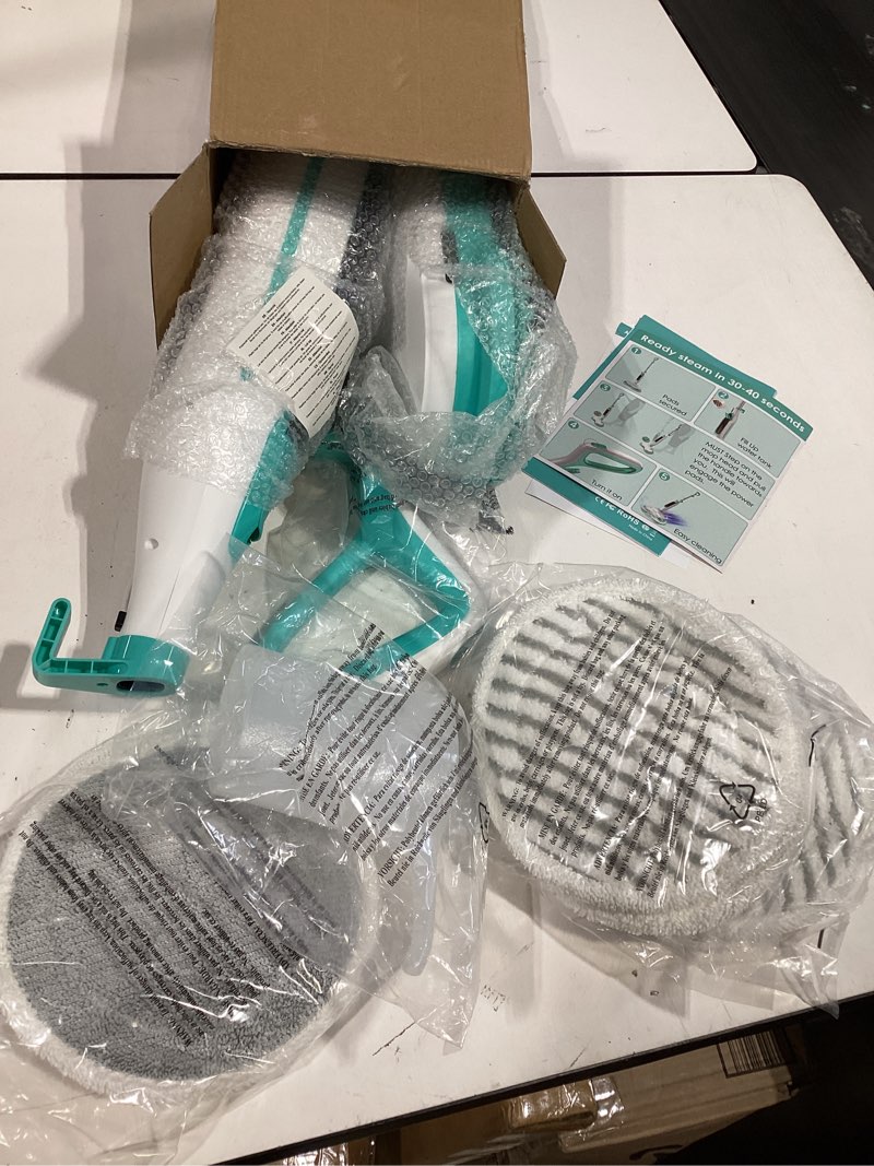 Condition photo showing Good Condition for scrubbing steam mop with rotating mop pads, all-in-one hard floor cleaner with led headlights, steam & spin control, 6 soft scrub pads, swivel steering, fs07 white