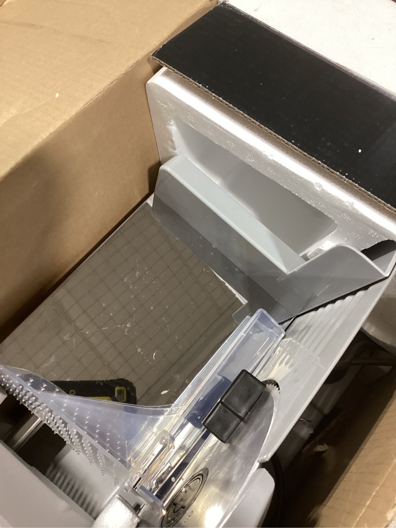 Condition photo showing New/Like New for OSTBA Meat Slicer Electric Deli Food Slicer with Child Lock Protection, Removable 7.5’’ Stainless Steel Blade and Food Carriage, Adjustable Thickness Food Slicer Machine for Meat, Cheese, Bread(150W) Meat Slicer-150Watt