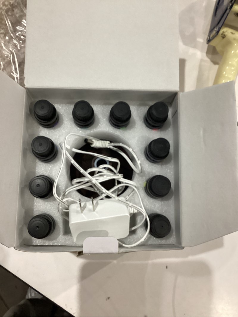 Condition photo showing As Is for InnoGear Aromatherapy Diffuser & 10 Essential Oils Set, 400ml Diffuser Ultrasonic Diffuser Cool Mist Humidifier with 4 Timers 7 Colors Light Waterless Auto Off for Valentine's Gift, Dark Wood Grain