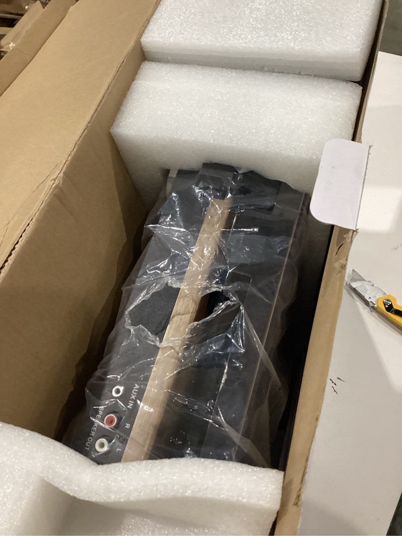 Condition photo showing As Is for victrola montauk vinyl record player, 3-speed belt driven turntable with stereo bluetooth speaker pair, rca output and 3.5mm headphone jack, removable dust cover, farmhouse walnut finish farmhouse walnut system