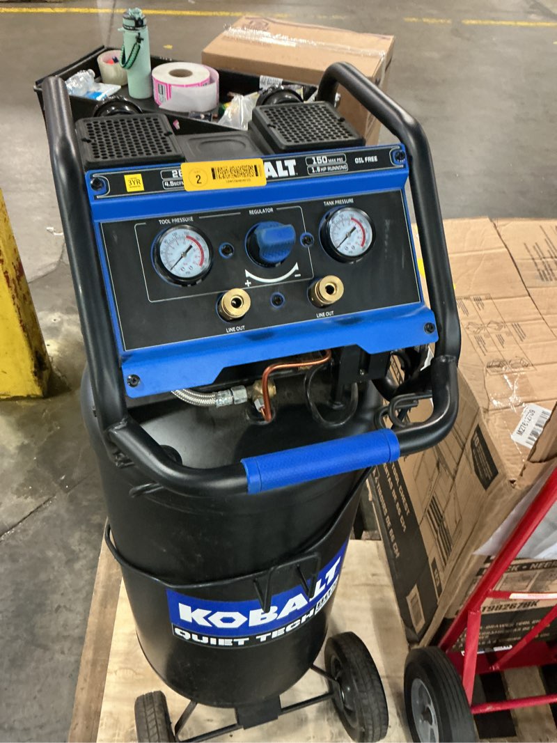 Condition photo showing As Is for kobalt quiet tech 26-gallon portable electric 150 psi vertical air compressor