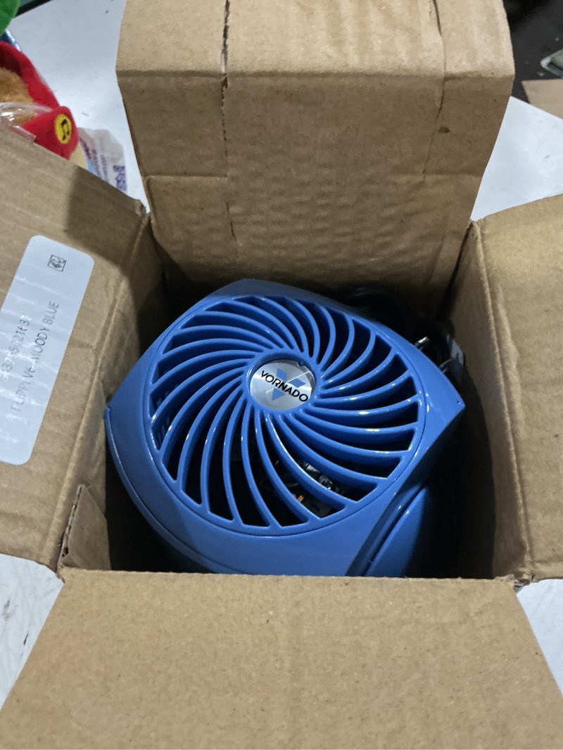 Condition photo showing As Is for vornado flippi v6 compact air circulator fan, 3.2" tabletop fan, adjustable head, 2 speeds, blue