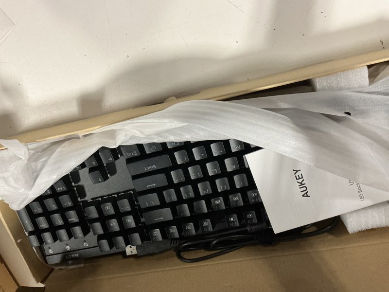 Condition photo showing Good Condition for aukey mechanical keyboard led backlit gaming keyboard with blue switches 104