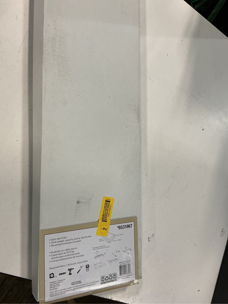 Condition photo showing As Is for allen + roth 36-in dark oak floating shelf