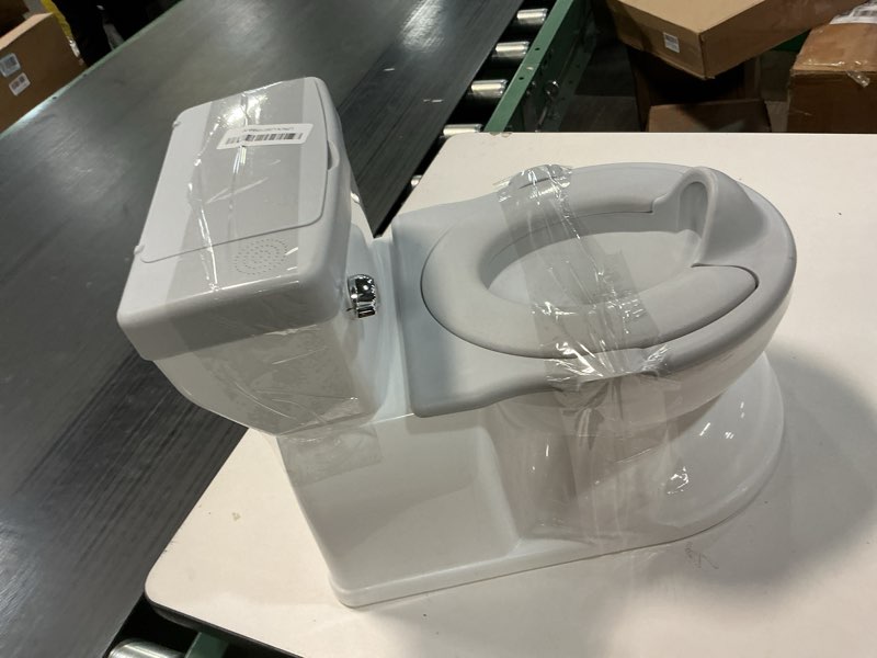 Condition photo showing As Is for Real Feel 2-in-1 Potty with Wipes Storage, Flushing Sounds & Disposable Liners - Realistic Toilet - Easy to Clean & Assemble - Jool Baby (Gray)