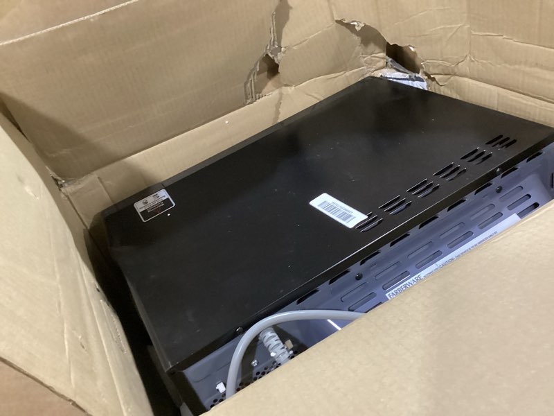 Condition photo showing As Is for Farberware 1.2 Cu. Ft. Countertop Microwave Oven – 1000 Watts Power, Auto Cook Settings, Defrost, Easy Clean and Child Safety Lock - Stainless and Black 1.2 Cu. Ft Stainless Steel