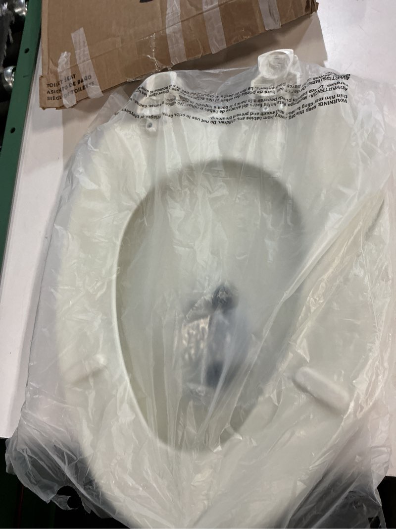 Condition photo showing Good Condition for Bemis Elongated Enameled Wood Toilet Seat in Biscuit with Easy•Clean? Hinge