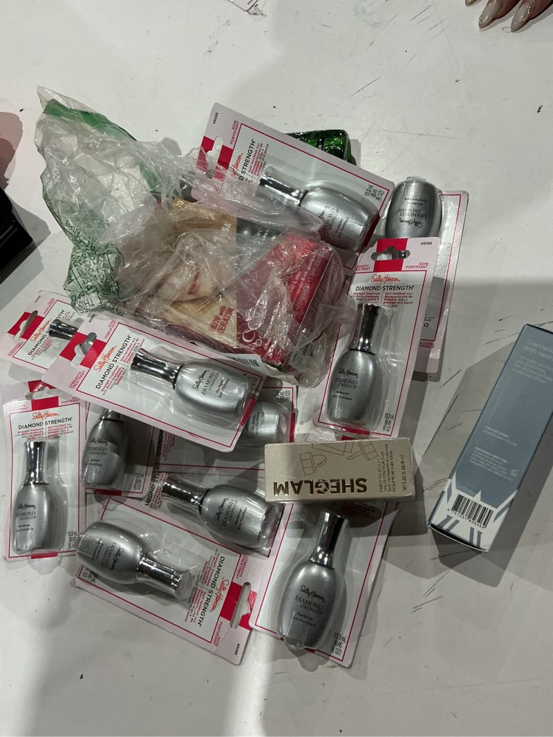 Condition photo showing As Is for assorted health and beauty lot