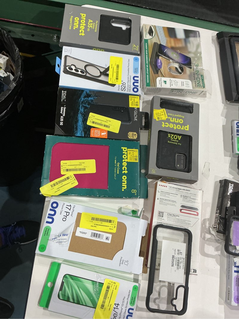 Condition photo showing As Is for assorted cellphone/tablet/laptop case covers & accessories