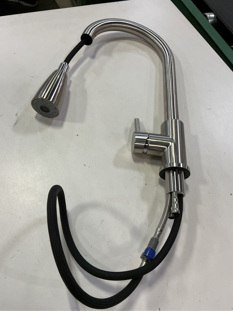 Condition photo showing As Is for WOWOW Chrome Single Handle Deck-mount Kitchen Faucet with Sprayer (Includes Deck Plate)