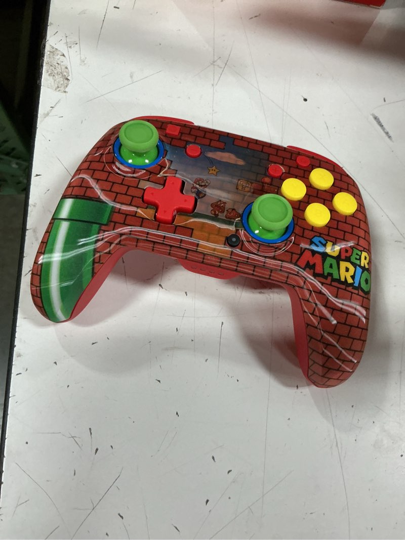 Condition photo showing Good Condition for turtle beach rematch wireless controller officially licensed for nintendo switch, switch lite/oled, works w/nintendo switch 2, lenticular shift design rechargeable battery – mario bricks reveal