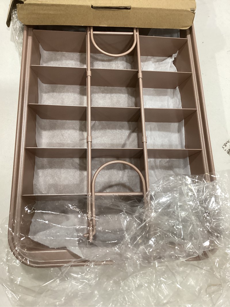 Condition photo showing Good Condition for Kundalini Brownie Pan with Dividers,Nonstick Brownie Baking Pan with Slicer Cutter Perfect for Baking Brownies, Bread, and Cookie Bites(Apricot)