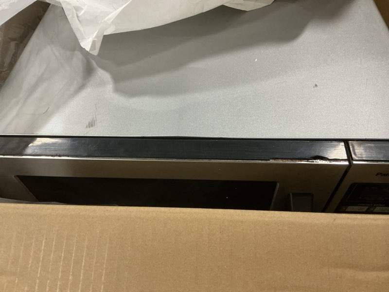 Condition photo showing As Is for Panasonic NE-1054F Compact Light-Duty Countertop Commercial Microwave Oven with 10 Programmable Memo