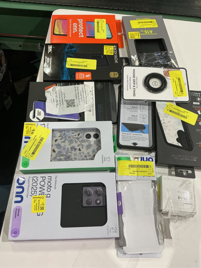 Condition photo showing As Is for assorted cellphone/tablet/laptop case covers & accessories