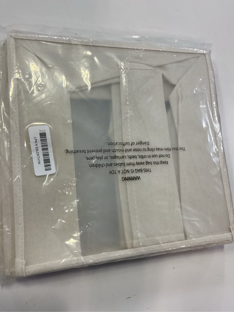 Condition photo showing New/Like New for household essentials 3 shelf 10 pocket canvas hanging shoe organizer collapsible closet storage, cream