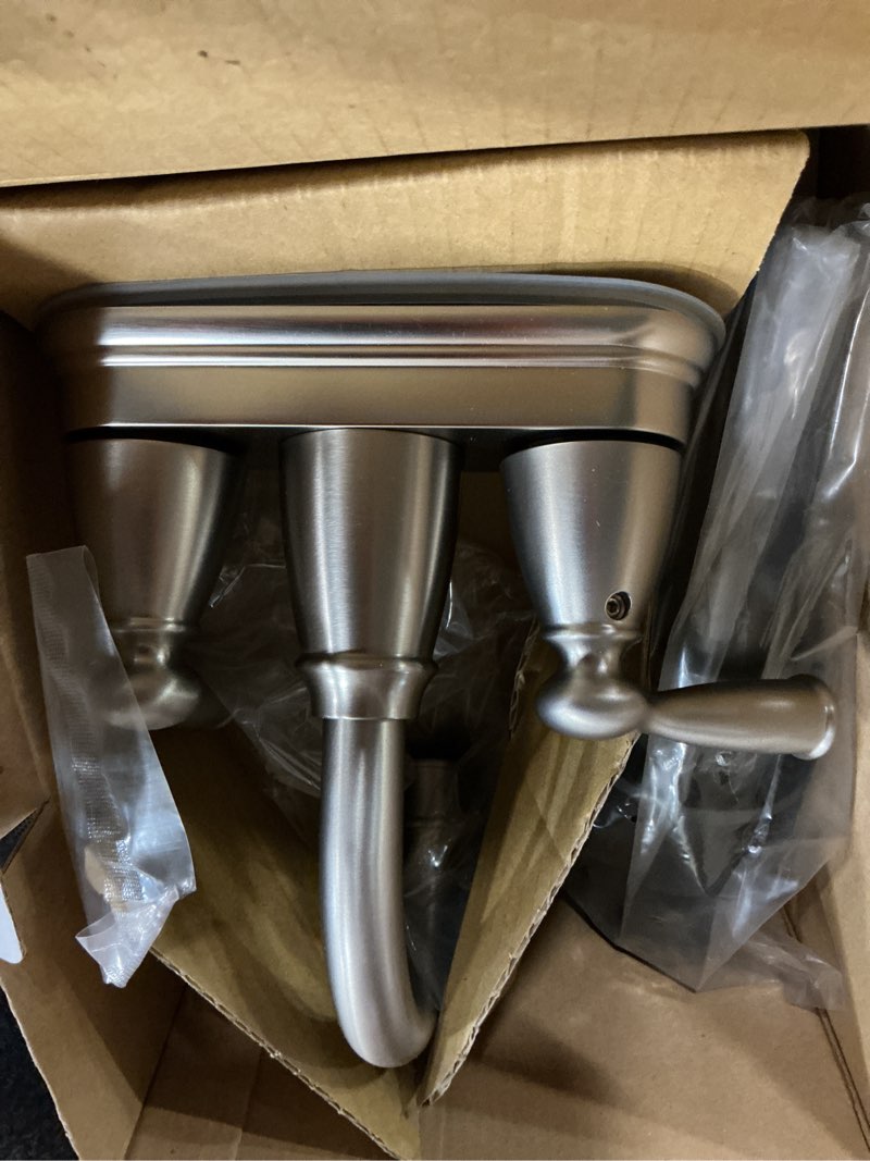 Condition photo showing As Is for moen banbury brushed nickel traditional centerset bathroom sink faucet 4 in.