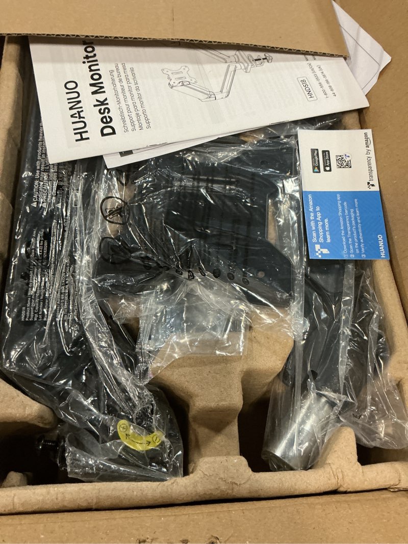 Condition photo showing New/Like New for huanuo dual monitor mount for 2 monitors up to 32 inches, each arm holds max 22lbs, dual monitor stand with advanced system, height-adjustable/tilt/swivel/rotate, vesa standard 75mm or 100mm