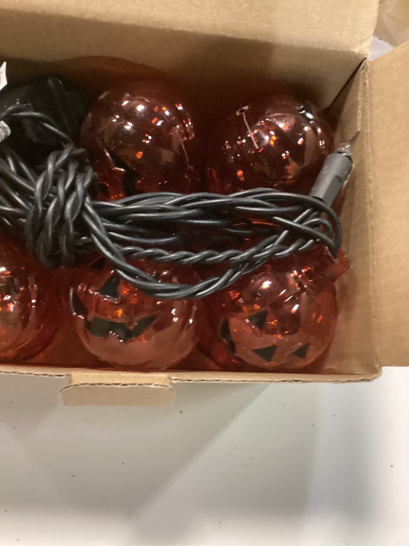 Condition photo showing Good Condition for Halloween Decorations Pumpkin Lights, 8.5 Feet Clear Pumpkin String Lights. 10 Pack Orange Pumpkin Lantern Lights for Halloween Indoor Outdoor Party Patio Yard Home Decor