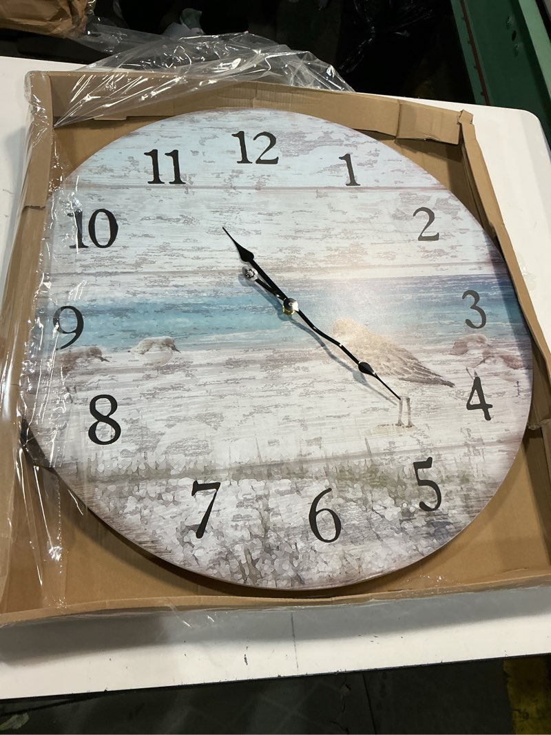 Condition photo showing Good Condition for young's inc wood sand piper wall clock - wall clocks for living room decor - functional and decorative beach, lake, and farmhouse wall clock - 23" w x 23" h