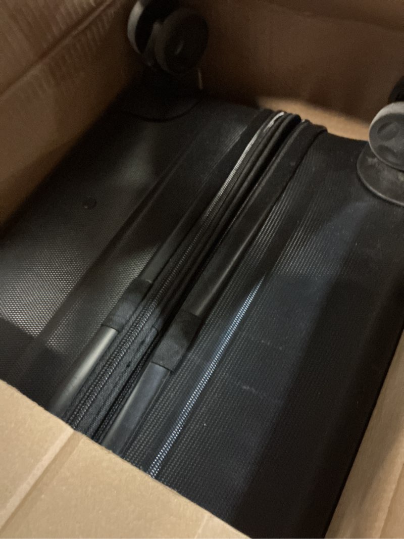 Condition photo showing Good Condition for Amazon Basics 30" Hardside Large Checked Luggage, Hardshell Suitcase With Wheels, Expandable For Up to 15% More Space, With Scratch-Resistant Surface, Four Multi-directional Wheels, Black Black Large Checked