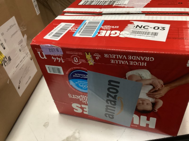 Condition photo showing New/Like New for Huggies Size Newborn Diapers, Little Snugglers Baby Diapers, Size Newborn (up to 10 lbs), 144 Count, Packaging May Vary