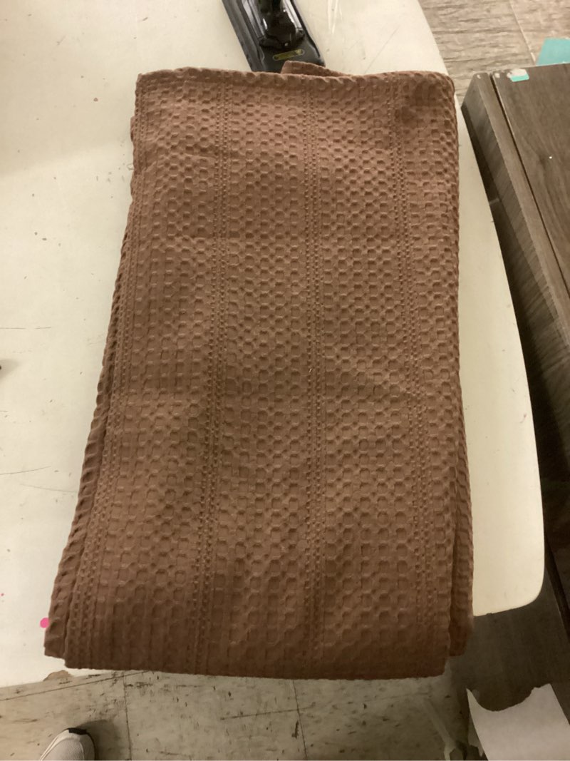 Condition photo showing As Is for brown sheet 