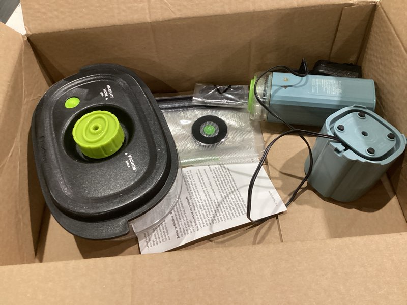 Condition photo showing Good Condition for FoodSaver Mini Handheld Vacuum Sealer Machine with Marinate Setting & Charging Dock | Cordless Food Vacuum Sealer for Freezer, Storage, Sous Vide, Meal Prep | Blue Vacuum Sealer + Container + 4 Bags