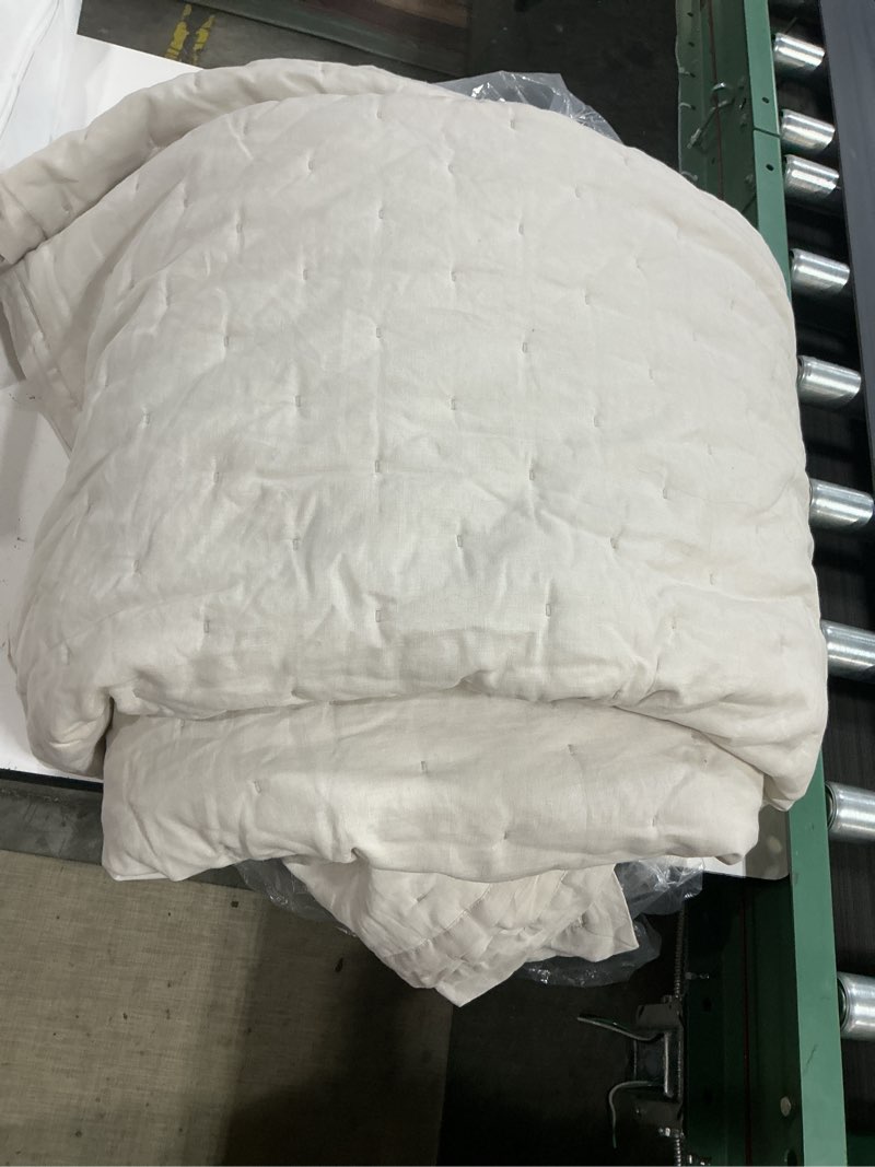 Condition photo showing As Is for european linen dream quilt, king/cal king, sand